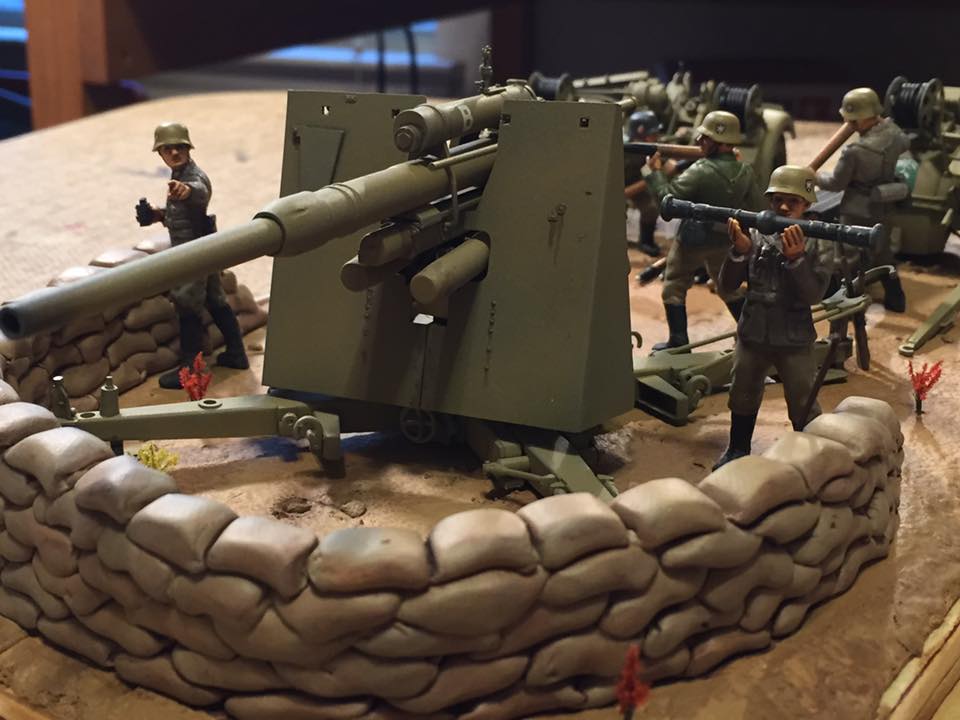88mm Flak36 (Tamiya 1/35)
15th Panzer Division, Halfaya Pass, Libya, June 15, 1941.

I built this model as the Flak36 variant and it represents German defenses during Operation Battleaxe, which was the second British attempt to retake the Halfaya Pass and relieve Tobruk. Concealed 88mm guns like this one decimated the advancing British tanks, earning it the nickname “Hellfire Pass”.
