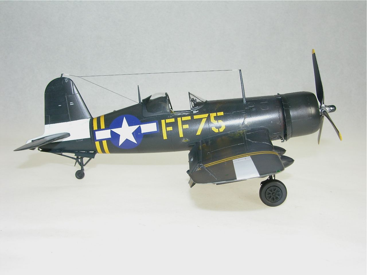 F4U-1D Corsair (Tamiya)
This is the Tamiya F4U-1D Corsair finished as Lt. Col. Donald Yost's airplane of VMF 351 from USS Cape Gloucester, ca. August, 1945. Decals are from BaracudaCals, interior details are Eduard.
