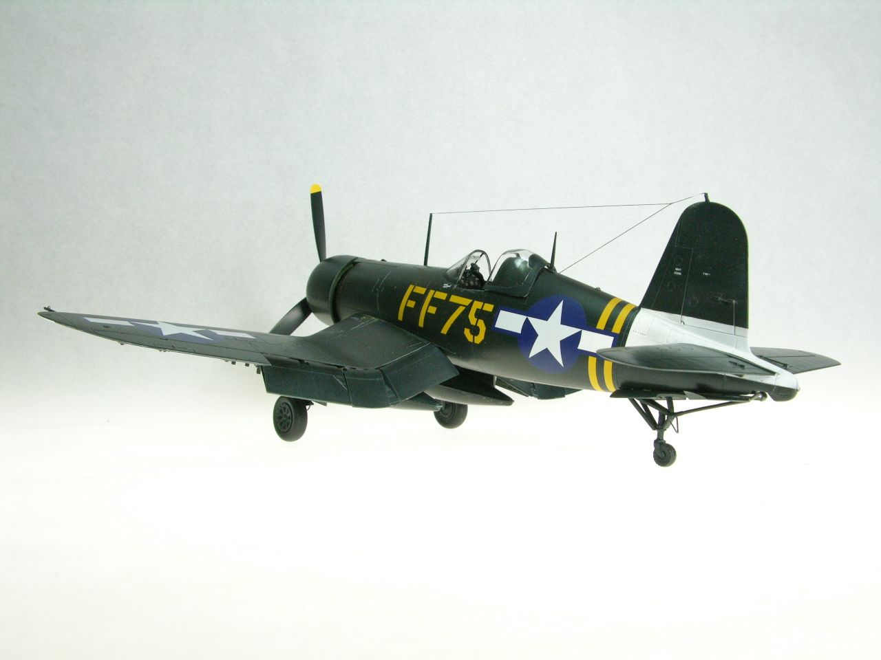 F4U-1D Corsair (Tamiya)
This is the Tamiya F4U-1D Corsair finished as Lt. Col. Donald Yost's airplane of VMF 351 from USS Cape Gloucester, ca. August, 1945. Decals are from BaracudaCals, interior details are Eduard.
