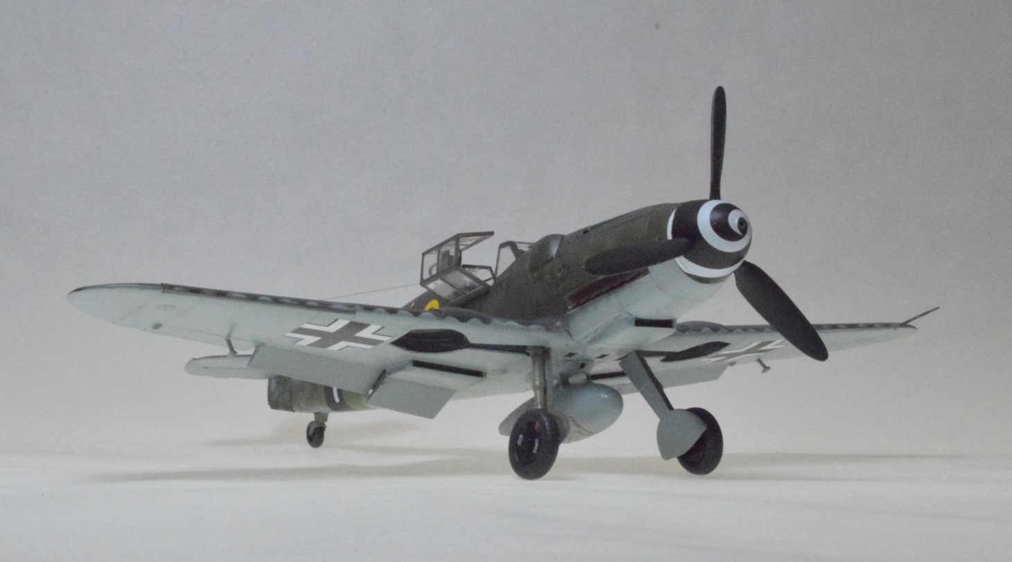 Me 109G-6, Modified (Eduard/Overtree 1/48)
This one took over three years to finally put away. Overtree kits are plastic only; no instruction, no decals, no PE. Just plastic.

This is an Me 109G-6, modified. Near the end of the war, Germany was hard pressed to build new aircraft. In this case a newer wing from one manufacturer was fitted to the older standard Me1-9G-6. The pilot defected, landing his airplane at a Canadian held airfield in Germany where it was carefully documented. 
