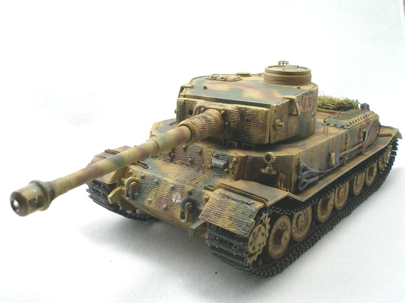 Tiger (P) of 653rd Schwere (heavy) Panzerjger Abteilung
DML 1/35 kit with Lion Roar PE set, Eduard barrel, and Friulmodel tracks. The zimmerit was done with Squadron putty using Karl Leidy's "Coke bottle cap" method.
