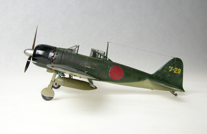 A6M5 Ty52 Zero (1/48 Hasegawa)
Finished as a Nakajima built aircraft. I used filters (oil paints thinly applied) to bring the colors and decals together and to simulate some of the weathering.
