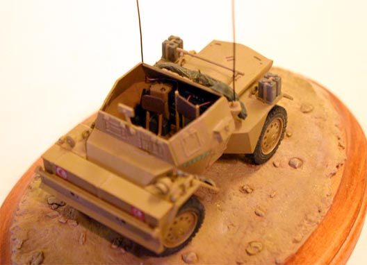 Daimler Mk II Scout Car (Tamiya 1/35)
Scratch built radio set, Bren Gun cartridge rack, tail lights. 
