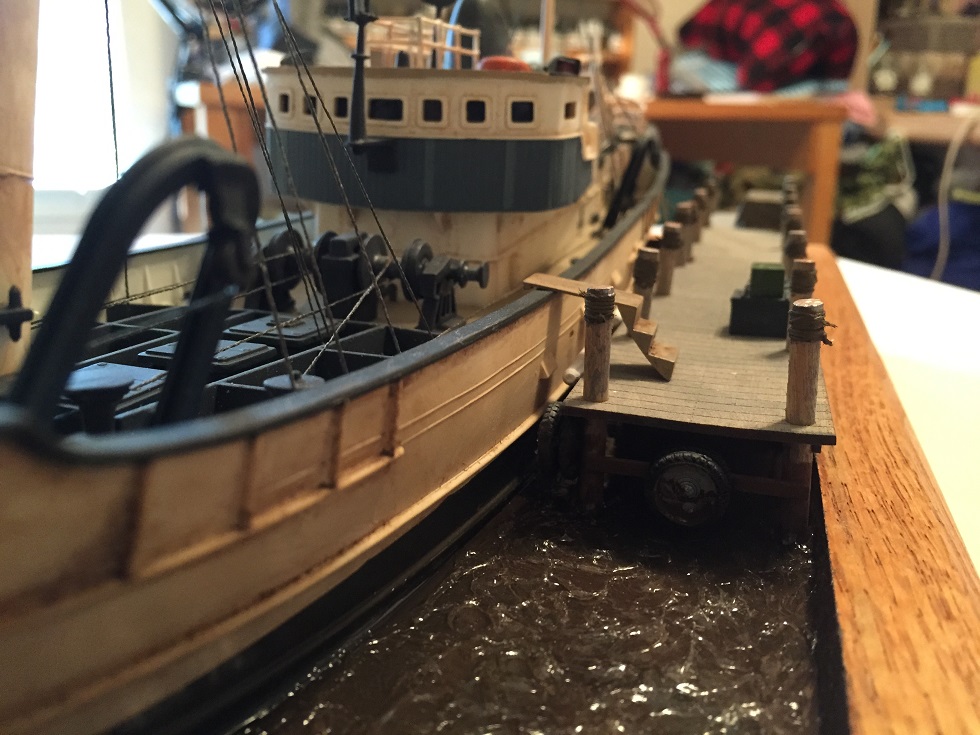 North Atlantic Fishing Trawler (Lindberg 1/90)
The Lindberg "North Atlantic Fishing Trawler" kit with HO Scale boat dock from Train Time Laser. Scratch built base, pilings, moorings. Water is Scenic Woodlands Realistic Water and Water Effects. 
