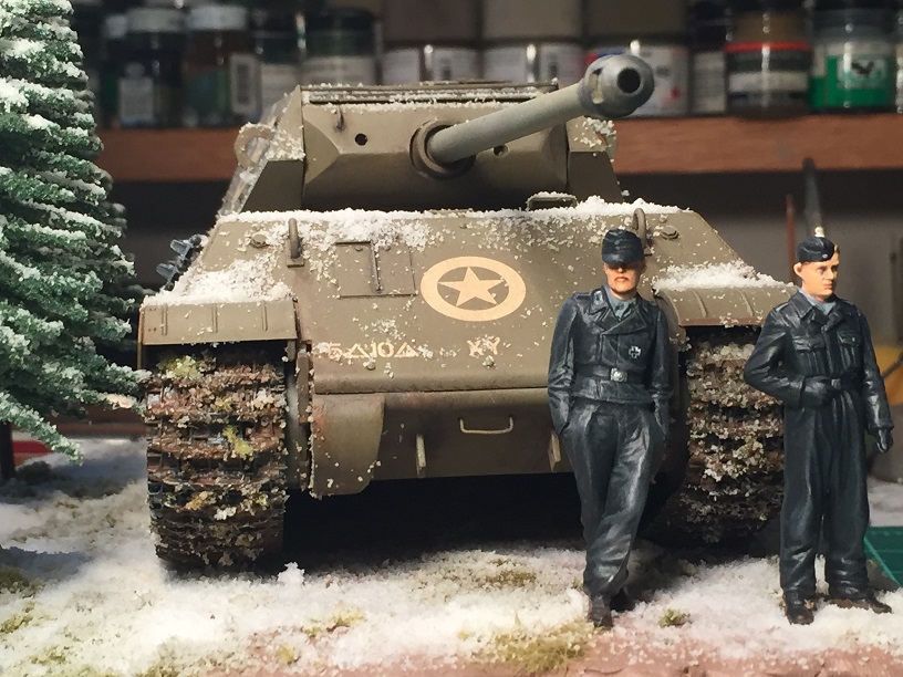 Ersatz M-10 (Tamiya 1/35 Panther G kit with Czech Masters Conversion Set)
This is one of ten Panther G’s that were modified to look like American M-10 tank destroyers as part of Operation “Greif”, which was a German false flag operation designed to take the Meuse river bridges during the Battle of the Bulge in late 1944.

The base model is the 1/35 Tamiya Panther G kit, but it has a metal barrel, a resin M-10 conversion set from Czech Masters, single link plastic tracks from Model Kasten and some PE grills from Eduard. All of this came out of the collection of Patrick Rourke who, sadly, passed earlier this year. I added the second crewman from another Tamiya kit. Also added some Bachmann trees to the scene.
