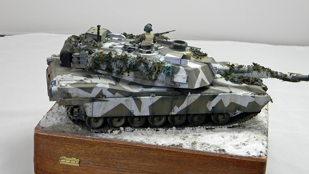 Marine M1A1 (Academy 1/35)
The color scheme is based on a real tank on exercises in Norway.
Camouflage netting all scratch. The figure is from MiniArt's Marine tank crew set.
