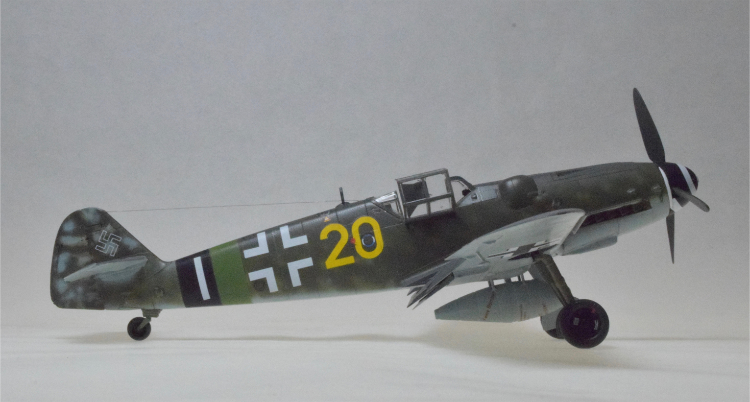 Me 109G-6, Modified (Eduard/Overtree 1/48)
This one took over three years to finally put away. Overtree kits are plastic only; no instruction, no decals, no PE. Just plastic.

This is an Me 109G-6, modified. Near the end of the war, Germany was hard pressed to build new aircraft. In this case a newer wing from one manufacturer was fitted to the older standard Me1-9G-6. The pilot defected, landing his airplane at a Canadian held airfield in Germany where it was carefully documented. 
