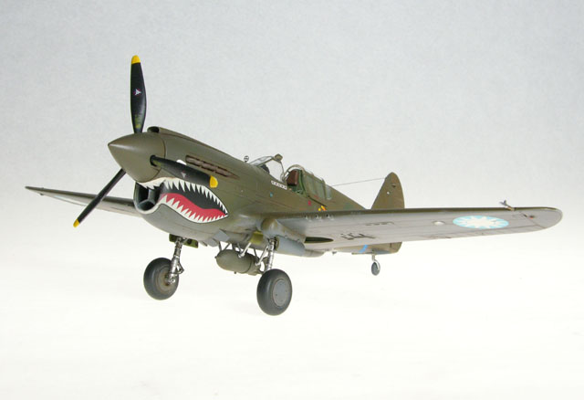 P-40
This is a P-40E from Hasegawa finished as Ed Rector's aircraft, one of the first "E" types supplied to the AVG as replacement aircraft.

[b][URL=http://www.austinsms.org/article2_06.php]Click here to read the feature article on this model.[/URL][/b]
