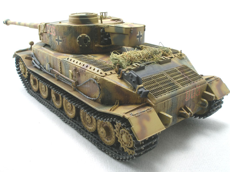 Tiger (P) of 653rd Schwere (heavy) Panzerjger Abteilung
DML 1/35 kit with Lion Roar PE set, Eduard barrel, and Friulmodel tracks. The zimmerit was done with Squadron putty using Karl Leidy's "Coke bottle cap" method.
