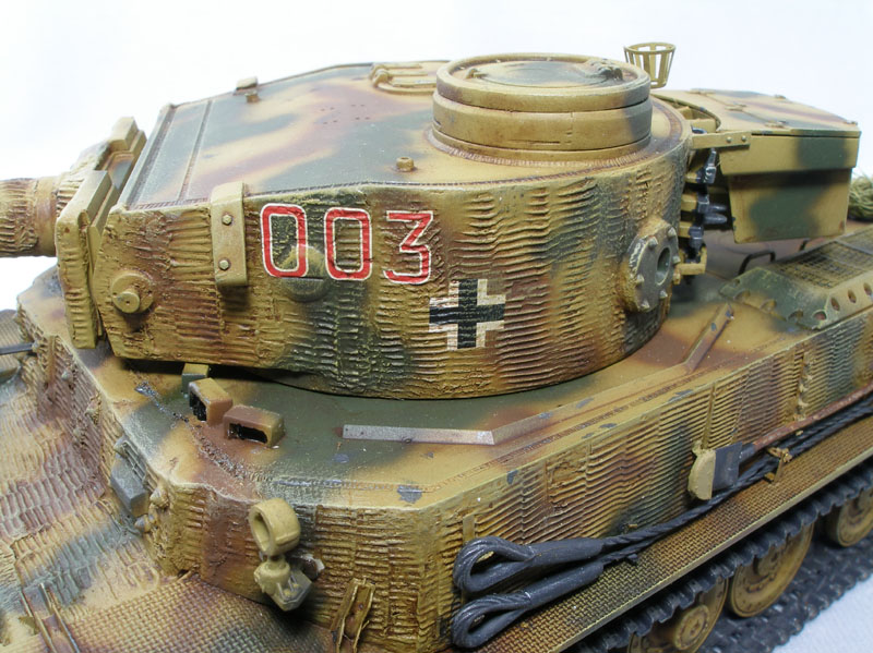 Tiger (P) of 653rd Schwere (heavy) Panzerjger Abteilung
DML 1/35 kit with Lion Roar PE set, Eduard barrel, and Friulmodel tracks. The zimmerit was done with Squadron putty using Karl Leidy's "Coke bottle cap" method.
