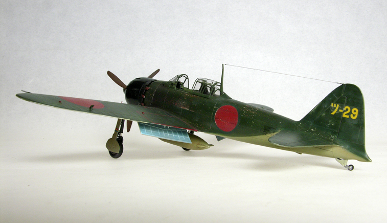 A6M5 Ty52 Zero (1/48 Hasegawa)
Finished as a Nakajima built aircraft. I used filters (oil paints thinly applied) to bring the colors and decals together and to simulate some of the weathering.
