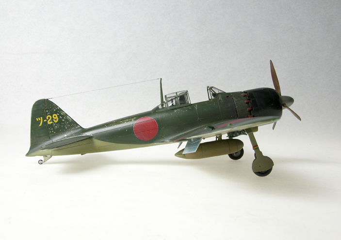 A6M5 Ty52 Zero (1/48 Hasegawa)
Finished as a Nakajima built aircraft. I used filters (oil paints thinly applied) to bring the colors and decals together and to simulate some of the weathering.
