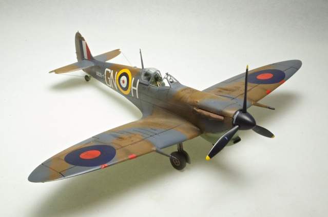 Spitfire Vb (Airfix 1/48)
Airfix 1/48 Spitfire Vb from the defense of Malta. The mid-stone color was covered over with extra dark sea gray since the mid-stone color was a yellowish tan and not a good camouflage over water. The markings and scheme—including the overspray— are all OOB.
