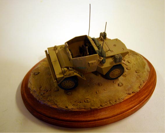 Daimler Mk II Scout Car (Tamiya 1/35)
Scratch built radio set, Bren Gun cartridge rack, tail lights. 
