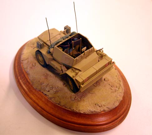 Daimler Mk II Scout Car (Tamiya 1/35)
Scratch built radio set, Bren Gun cartridge rack, tail lights. 
