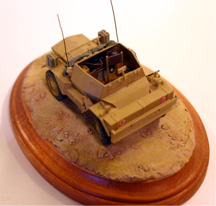 Daimler Mk II Scout Car (Tamiya 1/35)
Scratch built radio set, Bren Gun cartridge rack, tail lights. 
