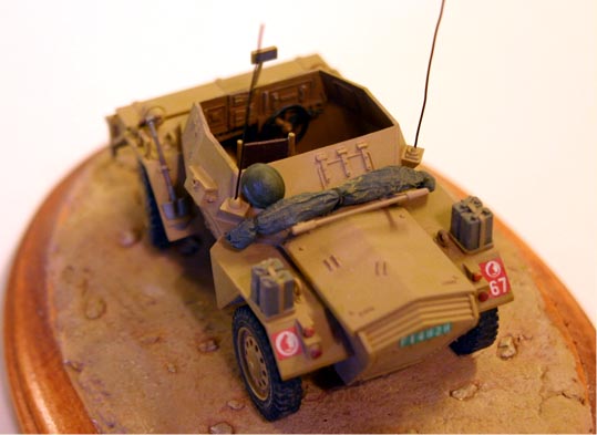 Daimler Mk II Scout Car (Tamiya 1/35)
Scratch built radio set, Bren Gun cartridge rack, tail lights. 
