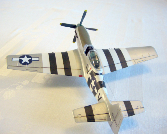 P-51D piloted by then Lt. Virgal "Sandy" Sansing, 359th FG, 8th AF, East Wretham, England. (1/48 Monogram)
The model is configured with bombs as it was for the second sortie of the day June 6, 1944.  Col. Sansing was guest speaker at the June 1994 meeting of the ASMS on the 50th anniversary of D-Day.   He now resides in New Braunfels, TX and has been the pilot of the Commemorative Air Force Cen-Tex Wing's P-39 for many years. Ret. Col. Sansing passed away June 30, 2014.
